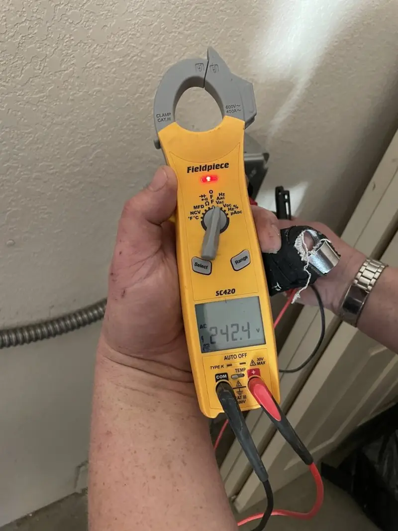 Voltage testing with clamp meter during Circuit Breaker Repair in Ravenswood